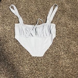 Lite blue princess Polly top. (Size 2)